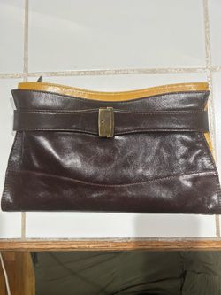 vintage Flavi Olivera (often spelled Flavio Olivera) Italian leather fold-over bag. The brand is highly regarded for its distinctive, butter-soft prem