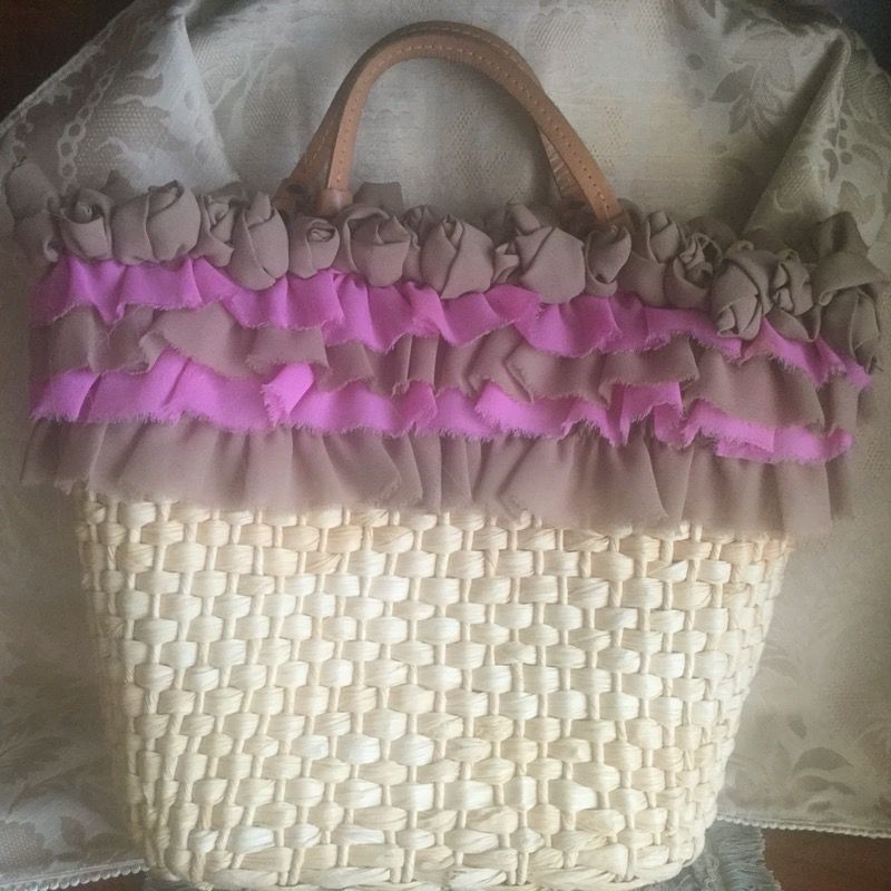Straw bag trimmed with roses