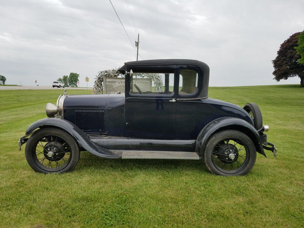 Photo 1929 Ford Model A hardtop coupe. Restored and excellent condition. $18,000 or best offers. Only serious buyers call contact info removed.