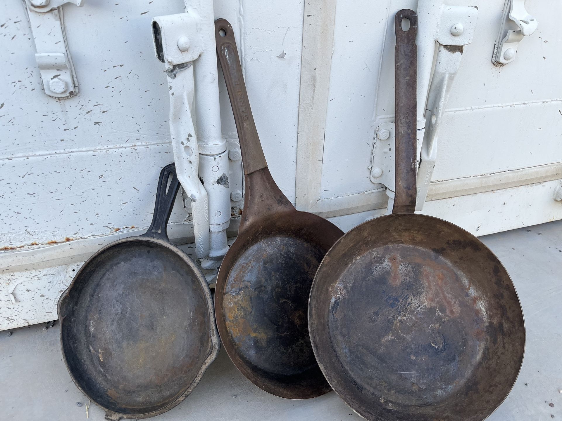 Three Cast-Iron Skillets