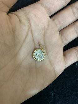 Atocha baby silver coin in gold bezel pendant
