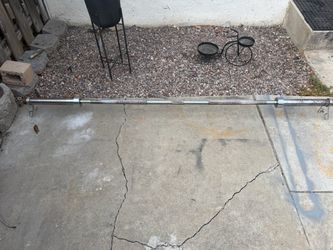 Olympic bar 7 foot long 45 lbs with clips