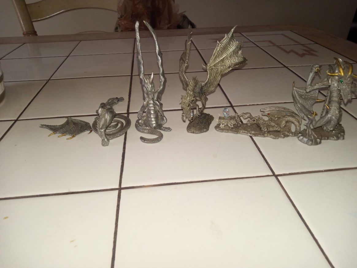 1(contact info removed)  Cast Metal Dragon Figures