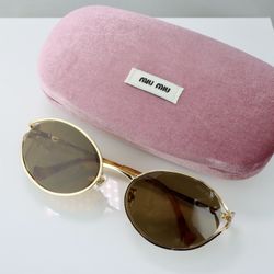 Miu Miu Logo Oval Sunglasses in Gold with Brown Lenses