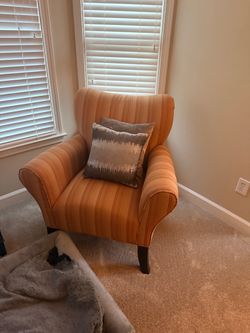 Two wingback armchairs