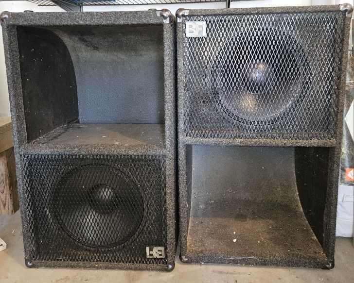 2 BFI SC-112 12 Inch Sub-Woofer In Cabinet