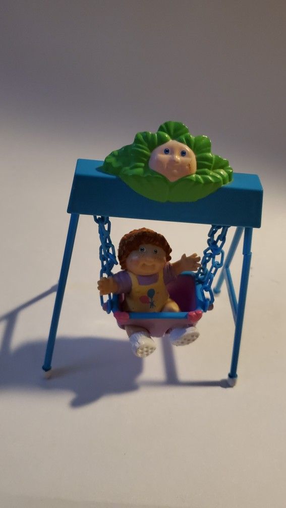 Vintage Small Cabbage Patch Doll Figurine On Swing