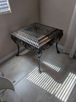 Three glass tables