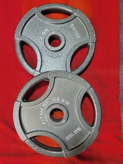 OLYMPIC PLATES  70LBs
2-35s  
11525 S HALSTED/7111.S WESTERN 
70$   CASH ONLY AS IS