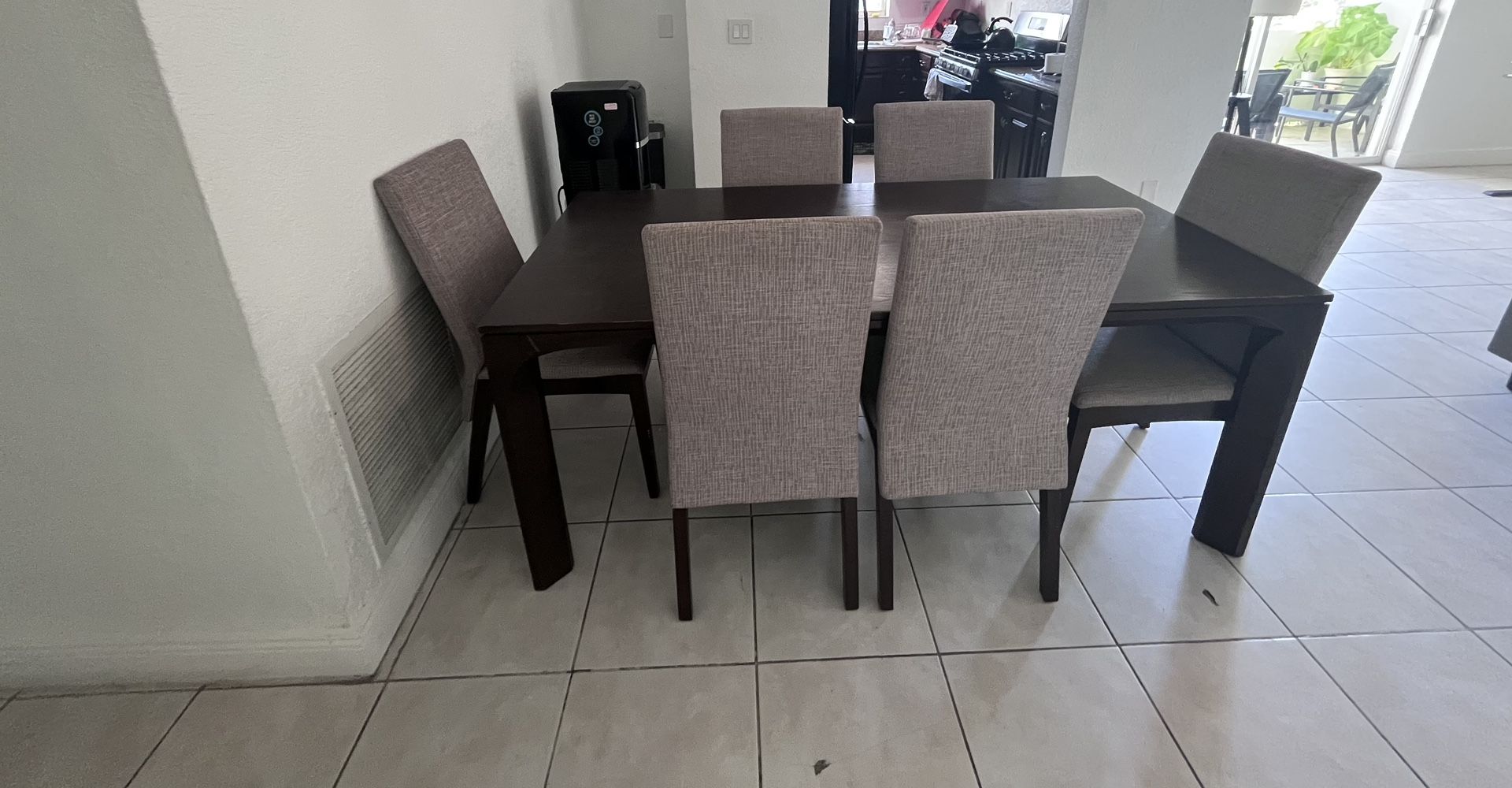 Dinnig Table And 6 Chairs