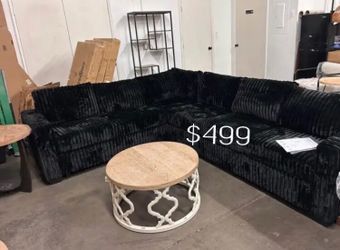 Stylish black sectional sofa fur-like jumbo corduroy