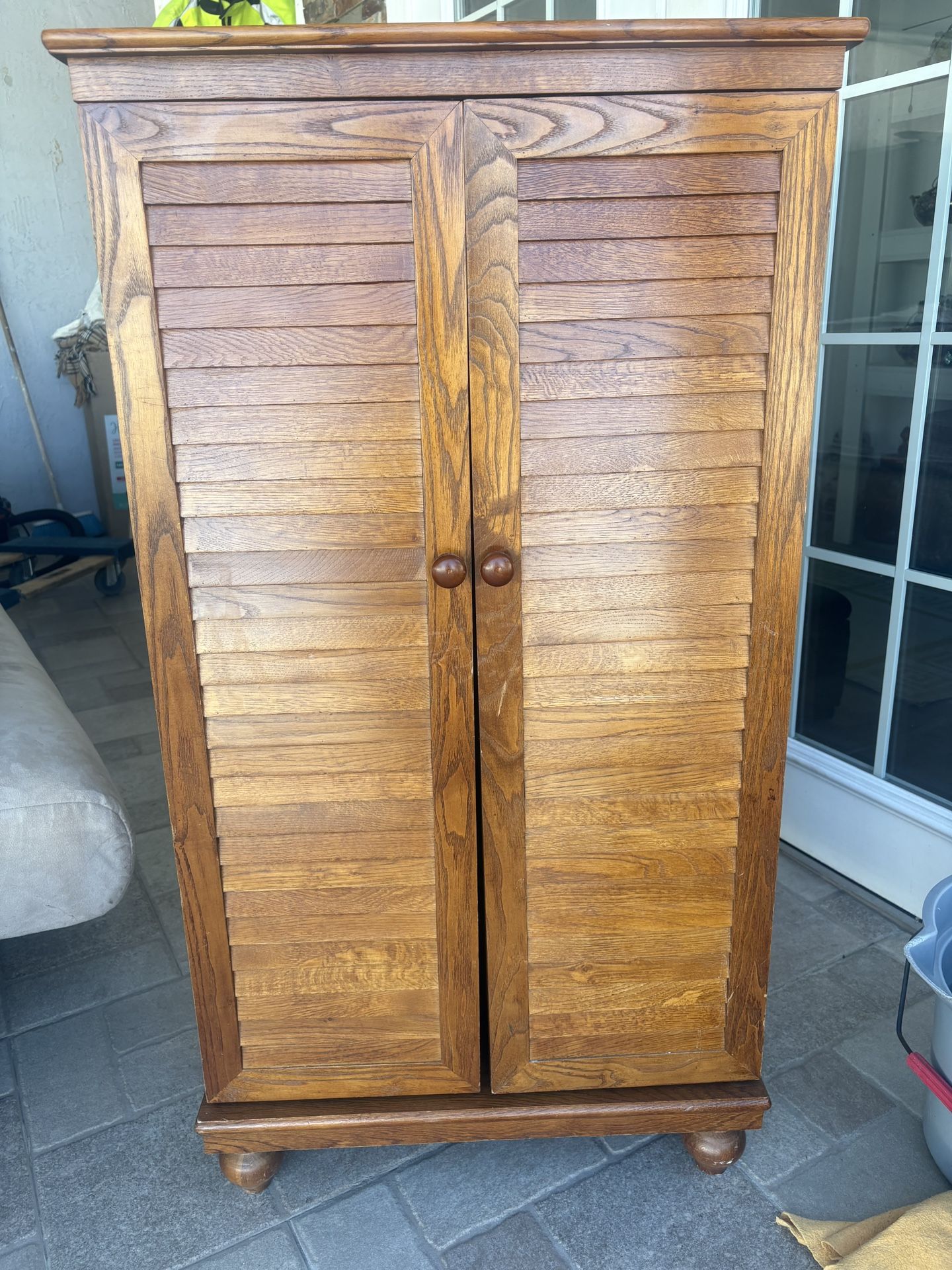 Solid oak cabinet with adjustable shelves