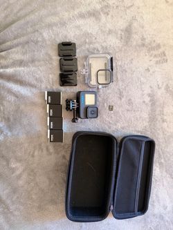 GoPro Hero 11 Black with extra batteries and microSD card