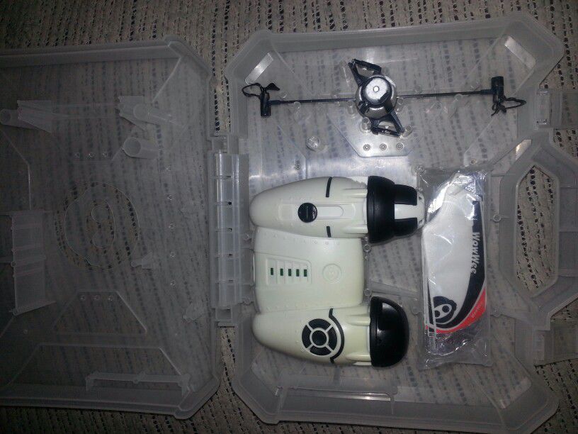 Flying drone in carrying case