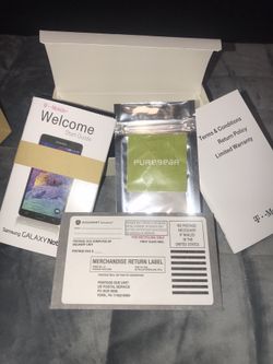 Samsung Galaxy Note 4 (box only) w/ headphones and earbud replacements, owners manual, warranty card and screen wipe. Great for packaging Samsung pho