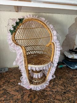 Small peacock-style wicker chair