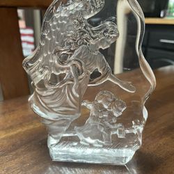Glass decorative figurine of Angel leading children across the bridge