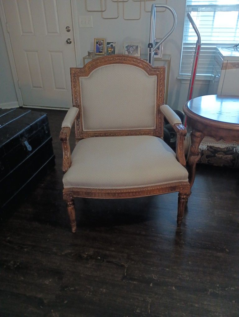 Two Carved Excellent Condition Wing Back Chairs And Side Table 