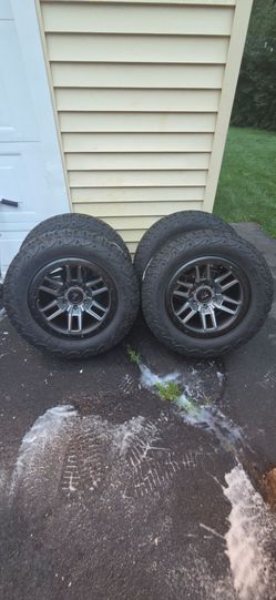For sale new set of wheels and tires 18x9 offset-12mm 6x139.7