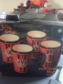 Brand new Halloween coffee cup set of four