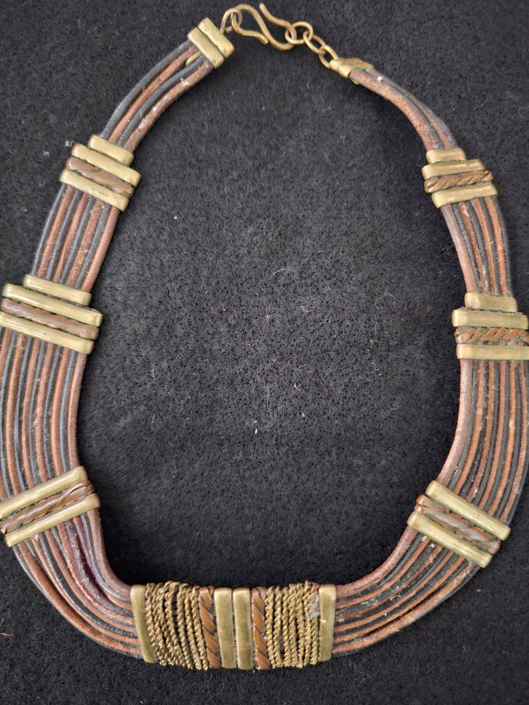 Alexis Kirk 1970s Leather and Metal necklace.
