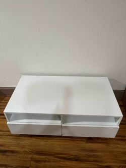 glossy white coffee table with 4 drawers with storage