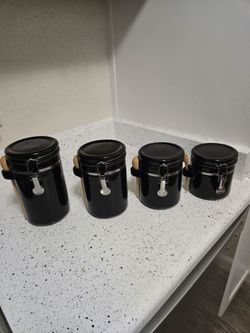 Set of 4 Black Ceramic Kitchen Canisters with Wooden Spoons