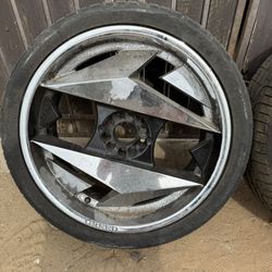 Continental sports plus technology tire with greed rim 265/35