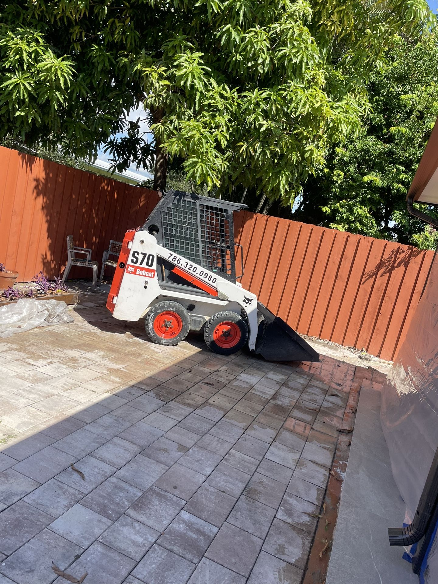 Bobcat And Excavator 