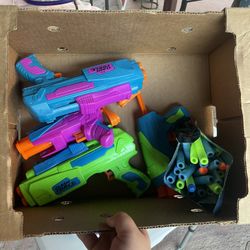 Four Nerf Guns and a bag of bullets