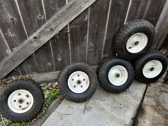 4 Wheelbarrow Tires And Rims. $5 For All