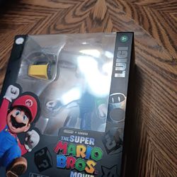 The Super Mario Bros Movie. Luigi action figure.
