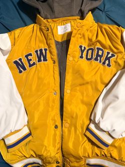 Kids size 10 New York Zara jacket. No stains, holes, or rips. Button or zip up jacket with removable hood. Like new!