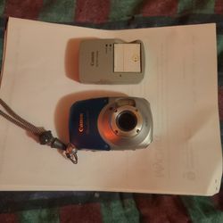 Cannon diving camera , waterproof of two thirty three feet.