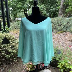 Jennifer Lopez brand flowy mint green top