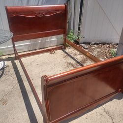 Full Sized Wood Sleigh Bed .Pick Up In Selden Ny..Price Is $75