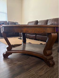 Brown round coffee table