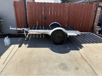 Small flatbed utility trailer