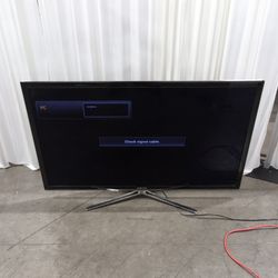 Samsung Black Flat Screen TV with Arch Stand