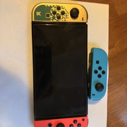 Nintendo Switch OLED – Zelda Edition – Amazing New Condition (No Games, comes with 3 controllers)