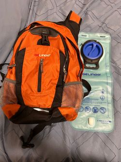 Orange Hiking Backpack w unused 2.5L Bladder /Camelback