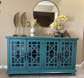 Teal 4-Door Glass Door Front Sideboard from Wayfair       Estimated (WxDxH): 60 x 16 x 34 in