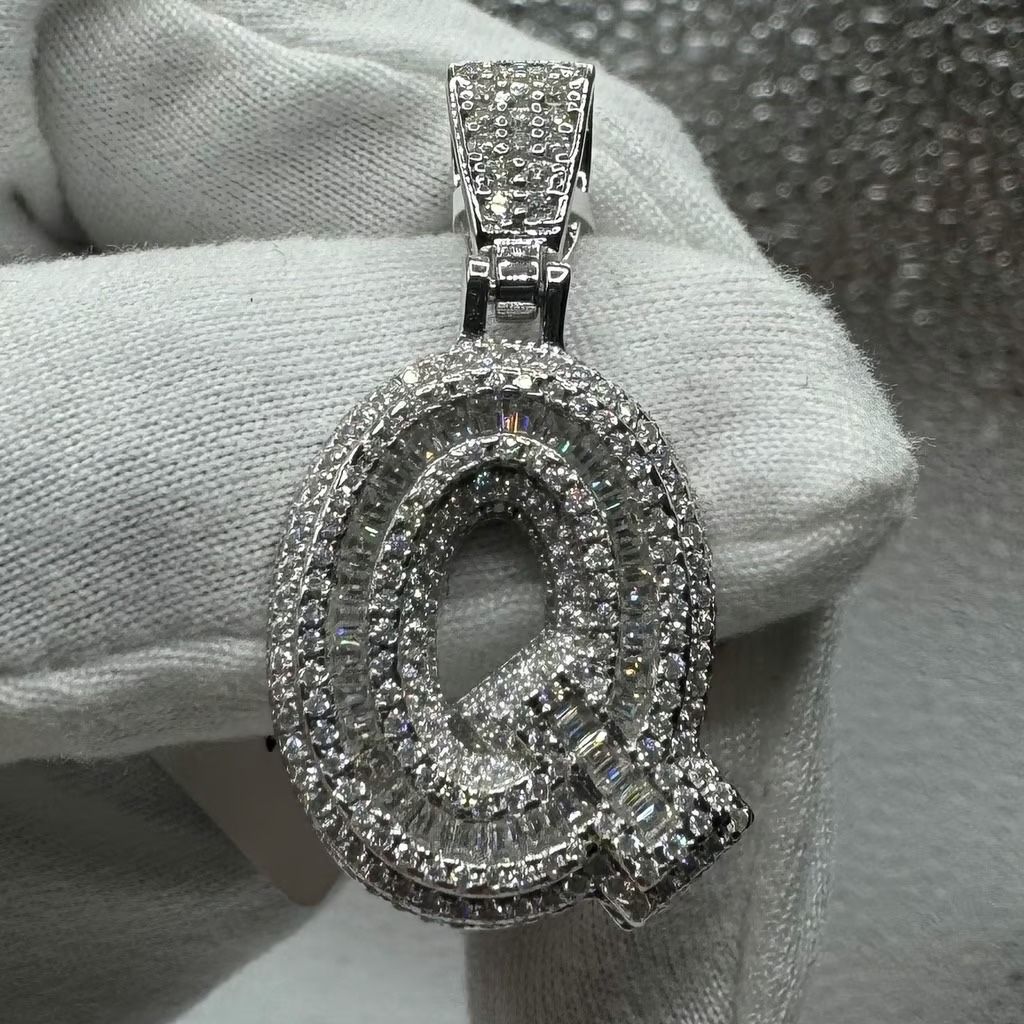 A Moissanite Initial in Sterling Silver with a CTW of 2.73 in Bugget Style