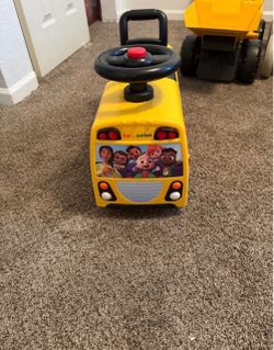CoComelon Musical School Bus Ride-On Toy
