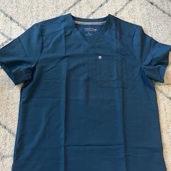 Fabletics Men’s Helix 1 - Pocket.  Scrub Top. Caribbean Blue Brand New