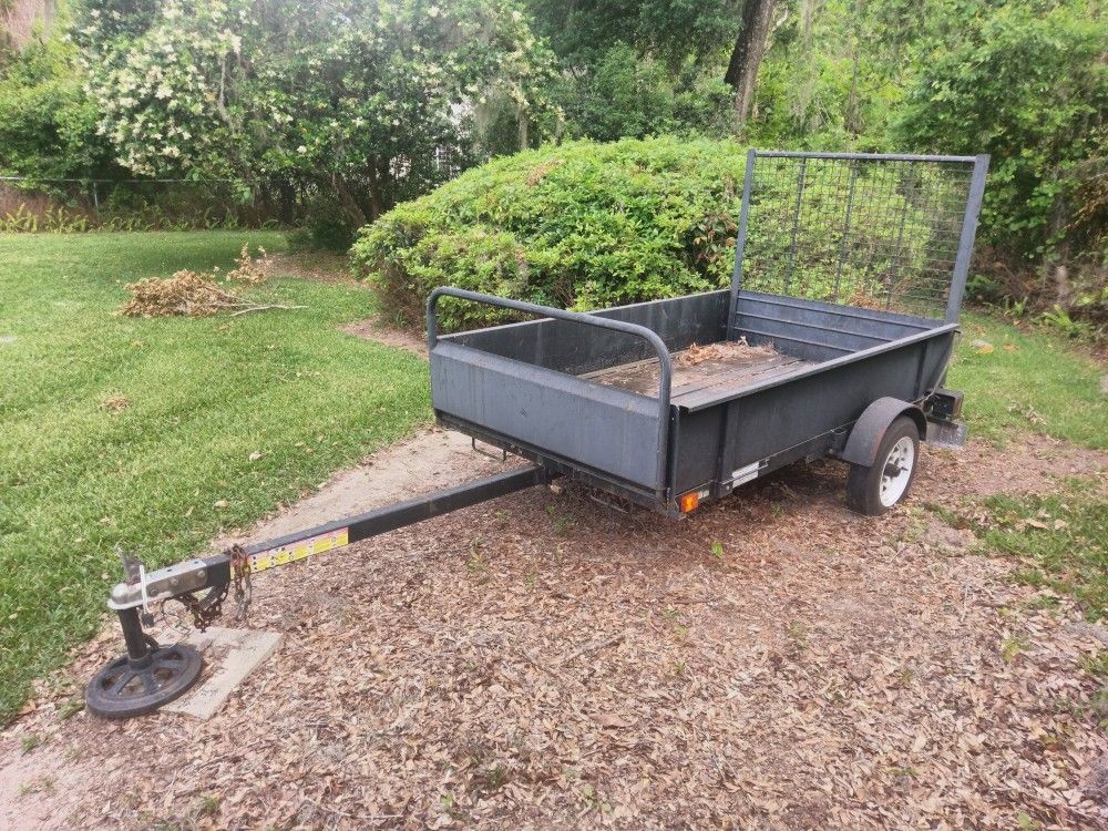 Snowbear utility trailer with ramp tailgate