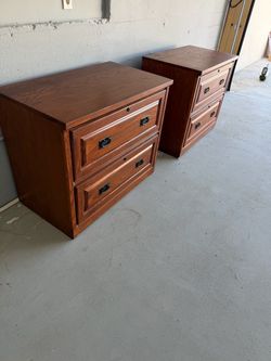 Two matching wooden 2-drawer cabinets with key/lock