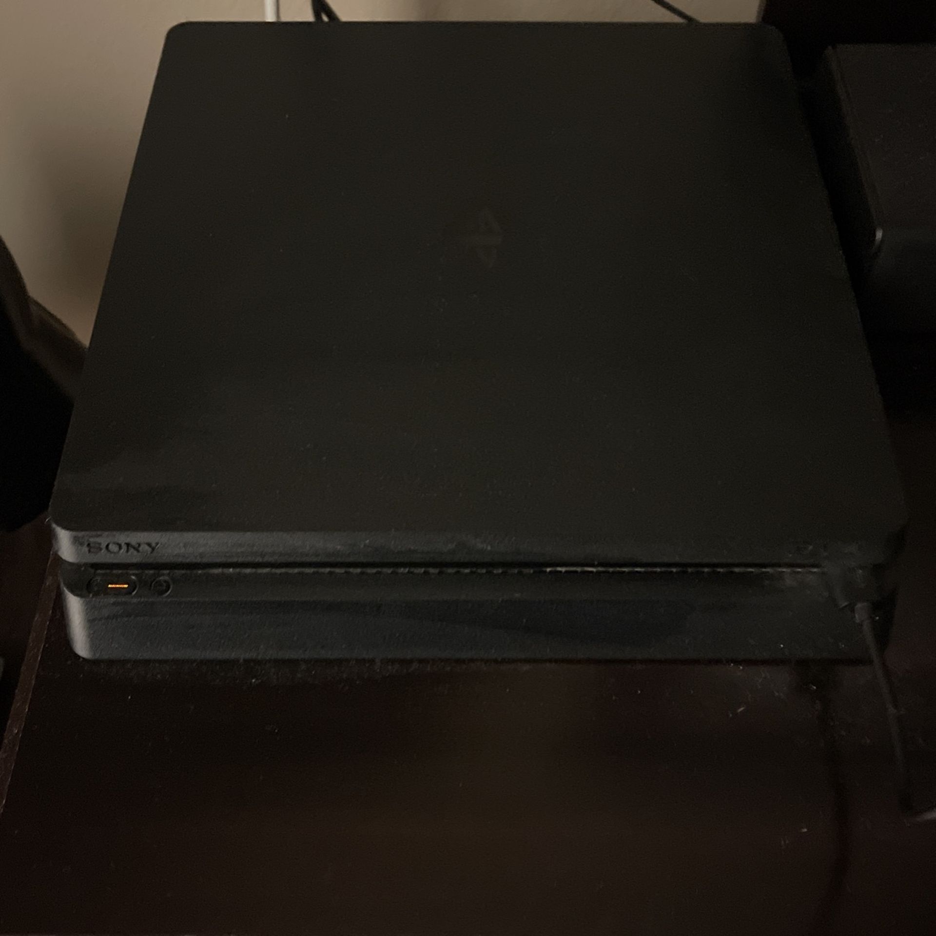 PlayStation 4 (1 Terabyte of Storage) and other items