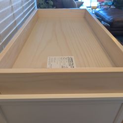 Dresser diaper pad holder