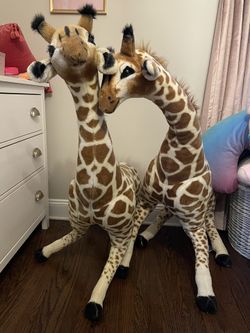 2 Melissa & Doug Plush Giraffes 